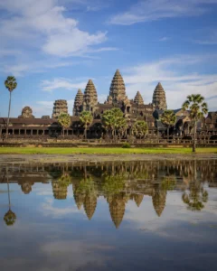 Travellers visiting Angkor Wat on a Cambodia tour package from India with India's best travel agency Roameaze.