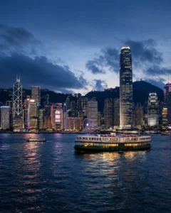 ravellers enjoying Hong Kong skyline views on a Hong Kong tour package from India with India's best travel agency Roameaze.