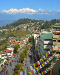 Travellers enjoying waterfalls and mountain views on a North East tour package with Roameaze.